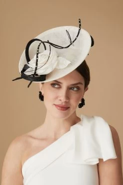 Assam White And Black Saucer Hat 8 Assam White And Black Saucer Hat -Hat Couture Shop ASSAM WHITE AND BLACK SAUCER HAT 2