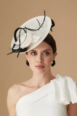 Assam White And Black Saucer Hat 9 Assam White And Black Saucer Hat -Hat Couture Shop ASSAM WHITE AND BLACK SAUCER HAT 3