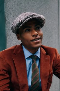 Muirfield Herringbone Bakerboy Cap 17 Muirfield Herringbone Bakerboy Cap -Hat Couture Shop MUIRFIELD HERRINGBONE BAKERBOY CAP LIFESTYLE SHOT 2